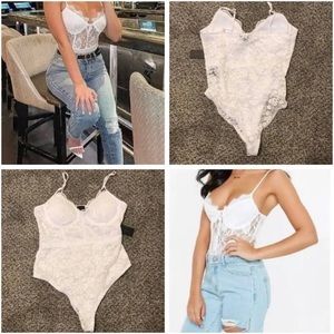 Women’s white lace body suit size large